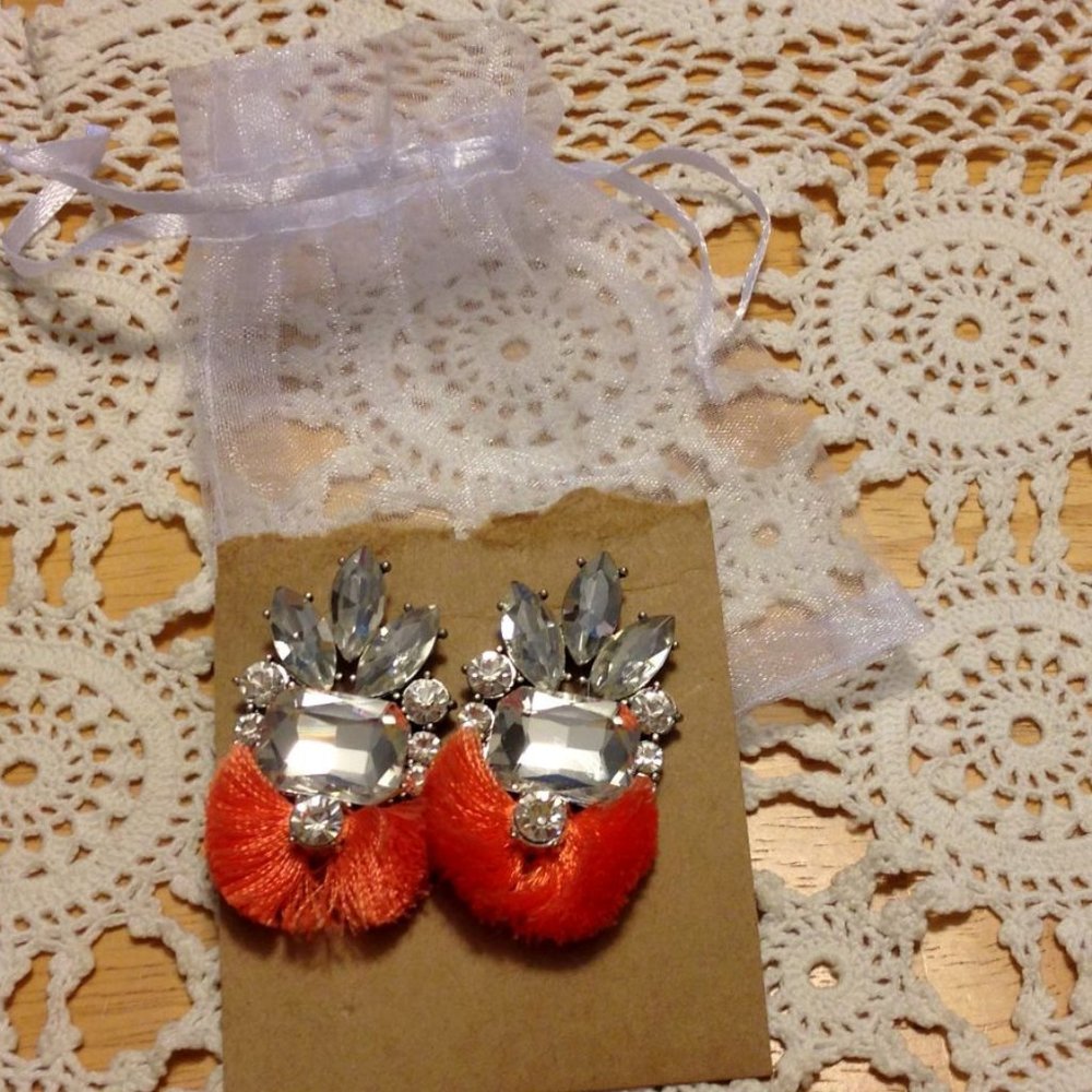 Plunder Earrings - Women's Jewelry Plunder rhinestone earrings, orange fringe